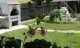 Gradina cu spatiu verde si zona BBQ