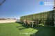 Terasa privată de 110 mp a penthouse-ului — gazon artificial, mobilier lounge